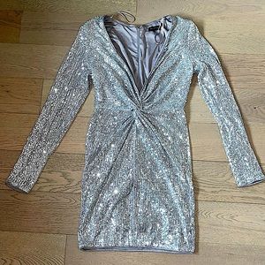 Miss Avenue Silver sequin dress with low cut, v neck.
